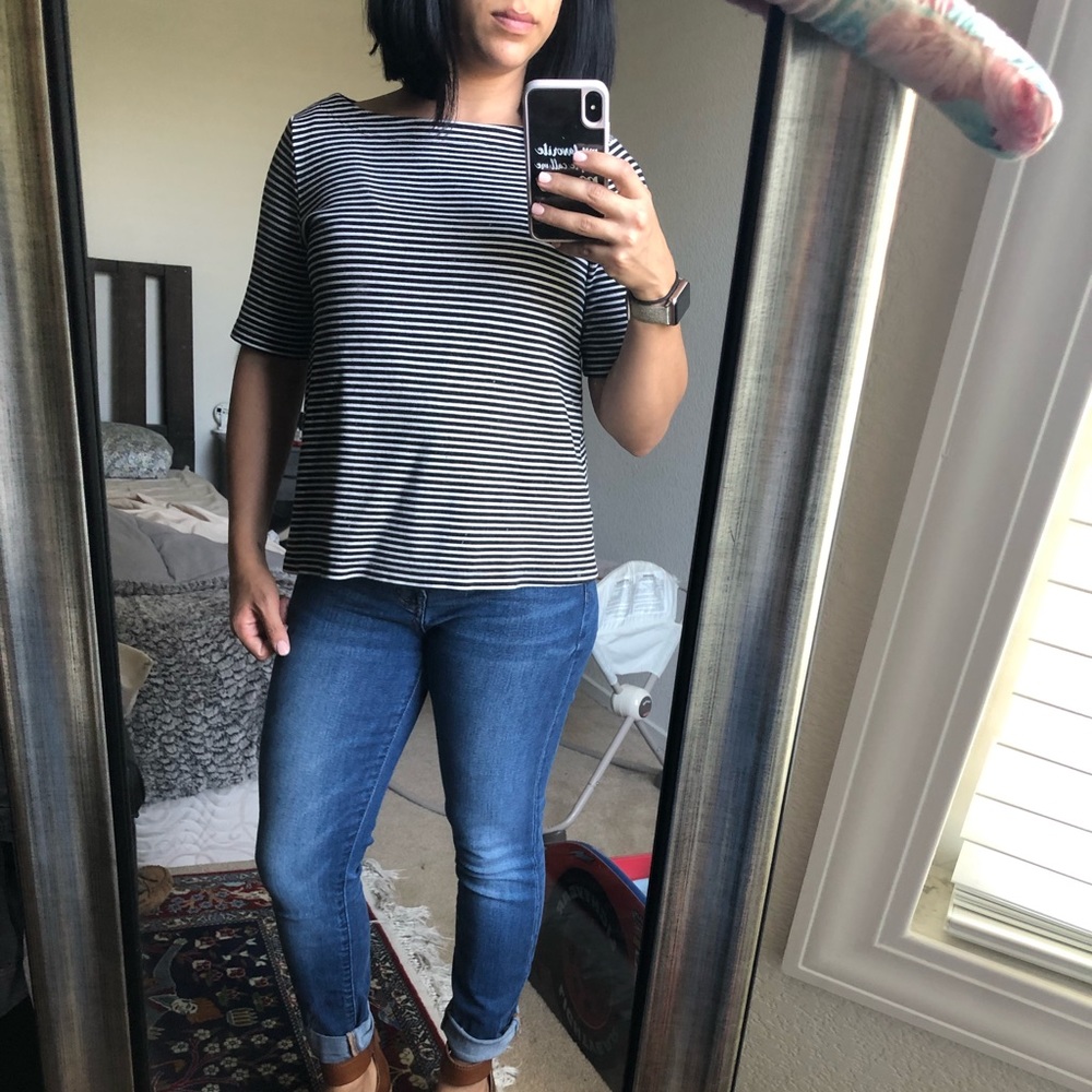 Black and white striped top.